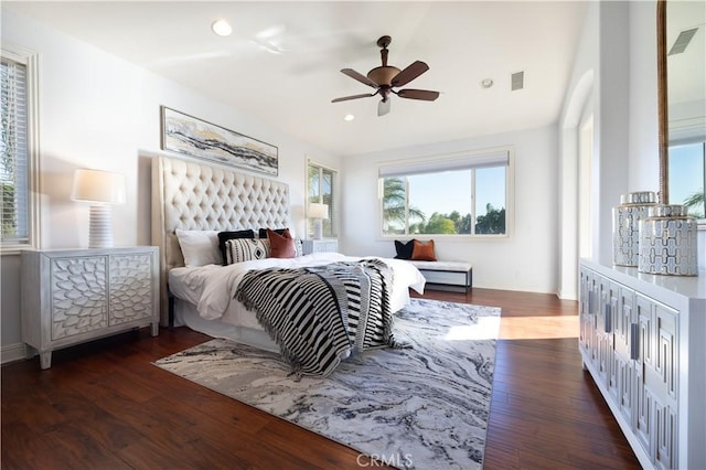 bedroom featuring ceiling fan and dark wood-type flooring