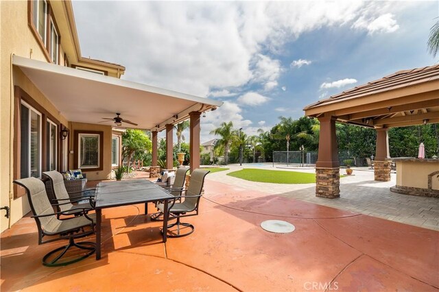 view of patio featuring ceiling fan