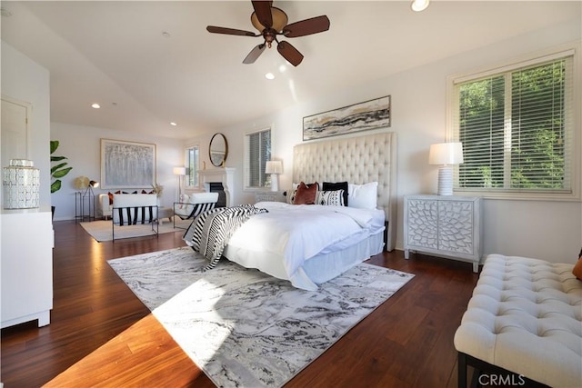 bedroom featuring ceiling fan and dark hardwood / wood-style floors