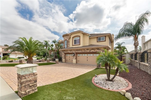 mediterranean / spanish house featuring a garage