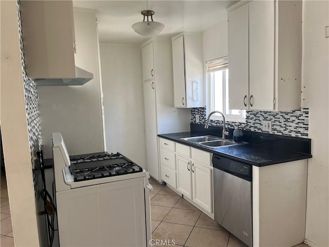 kitchen featuring white cabinets, sink, stainless steel dishwasher, light tile patterned floors, and white gas stove