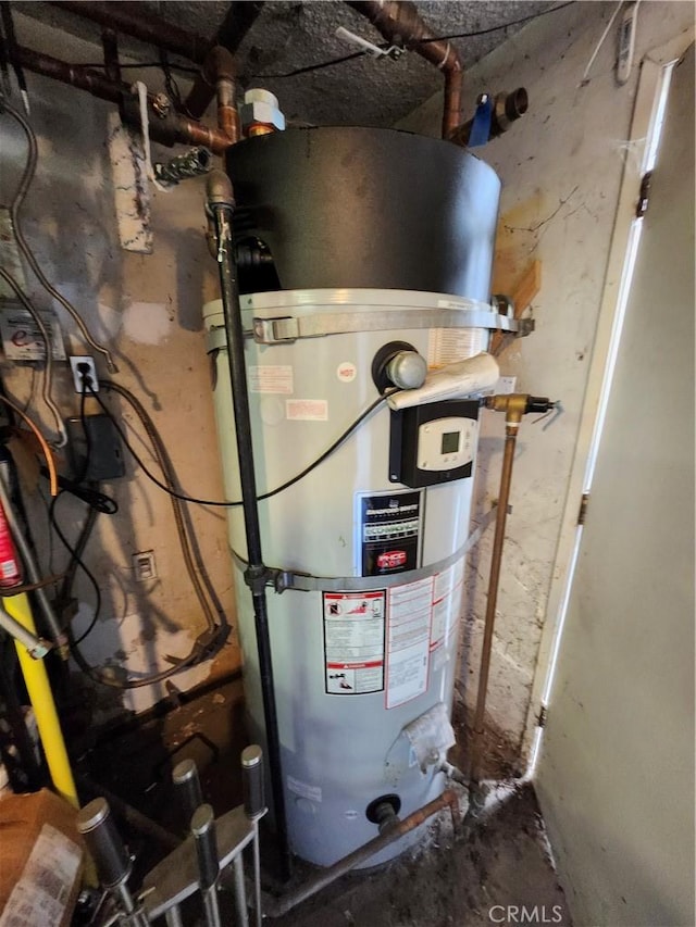 utility room featuring gas water heater