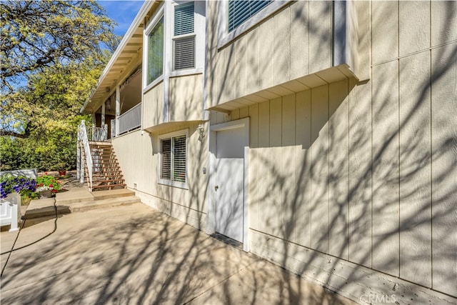 view of property exterior featuring a patio