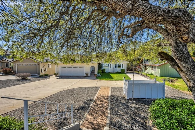 ranch-style home with a garage