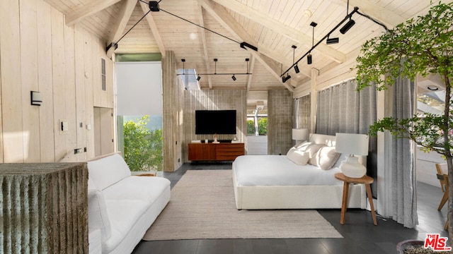 living room with wood walls, high vaulted ceiling, and wooden ceiling