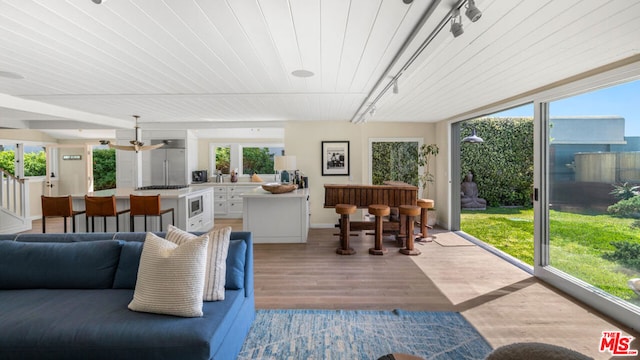 sunroom featuring a healthy amount of sunlight