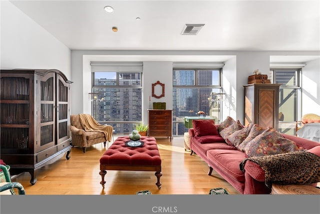 living room with light hardwood / wood-style floors