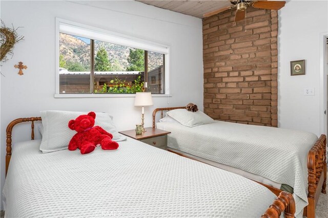 bedroom with wood ceiling