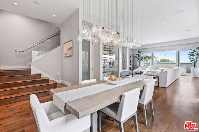 dining room with wood-type flooring