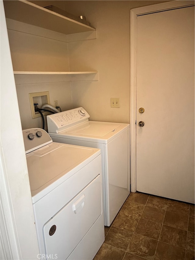 washroom featuring independent washer and dryer