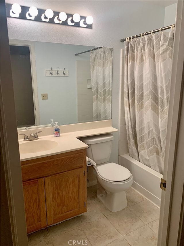 full bathroom with shower / tub combo, vanity, toilet, and tile patterned floors