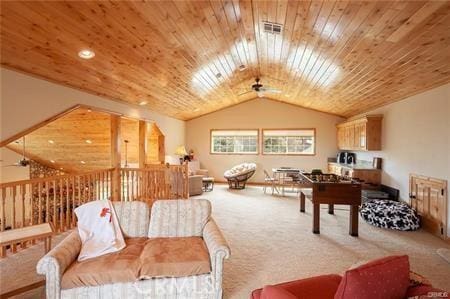 interior space with carpet, ceiling fan, wood ceiling, and vaulted ceiling