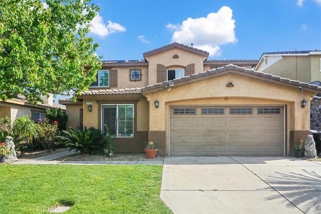 mediterranean / spanish home with a front lawn