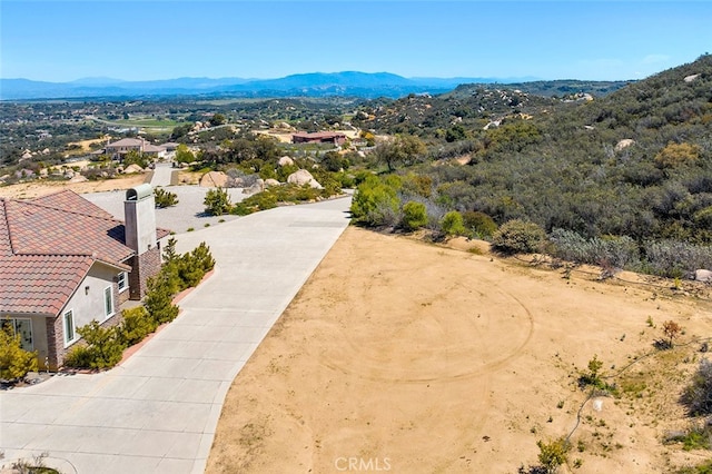 bird's eye view with a mountain view