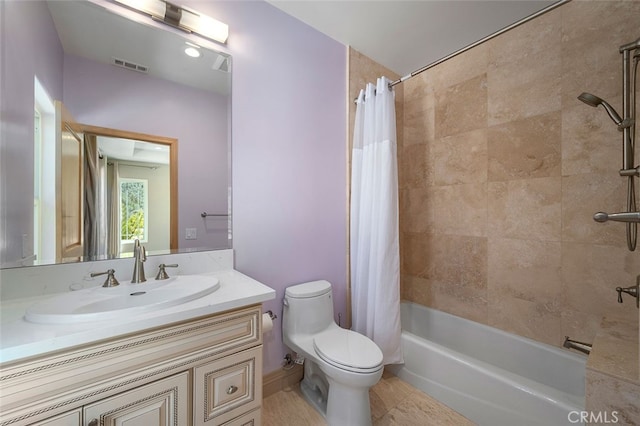 full bathroom with vanity, toilet, shower / bathtub combination with curtain, and tile patterned floors