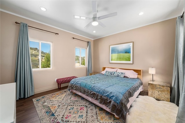 bedroom featuring dark hardwood / wood-style floors and ceiling fan