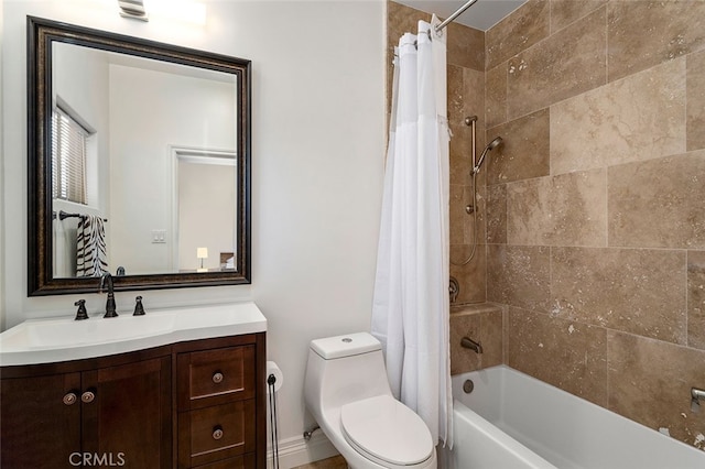 full bathroom with shower / bath combo with shower curtain, vanity, and toilet