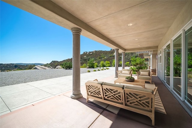 view of patio with a mountain view