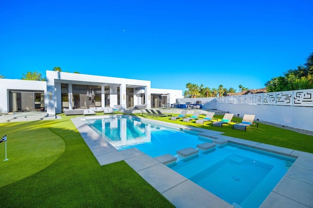 view of pool featuring an in ground hot tub