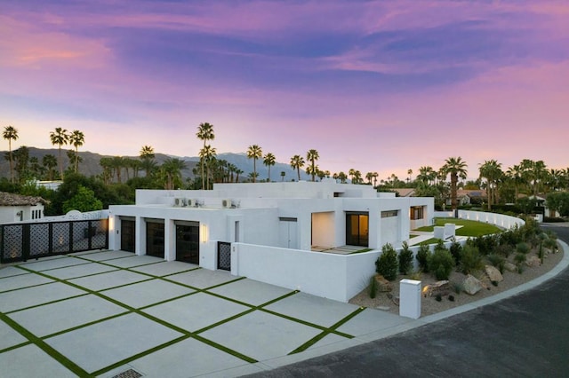 contemporary house featuring a mountain view