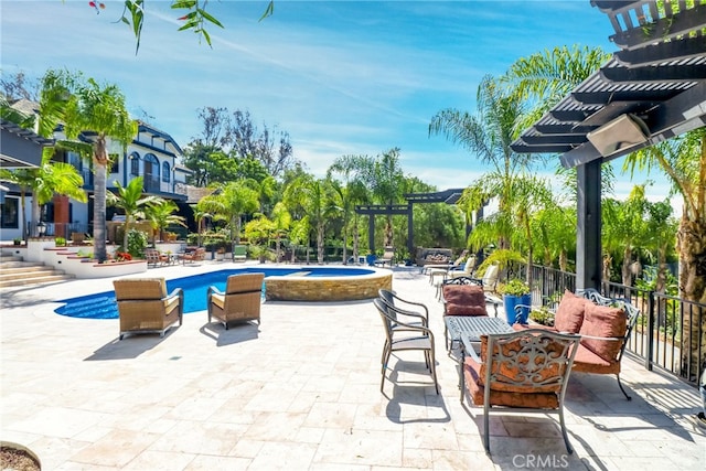 view of patio / terrace with a pergola and a fenced in pool