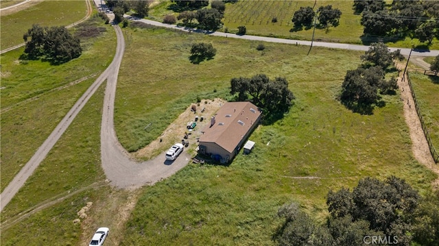 birds eye view of property featuring a rural view