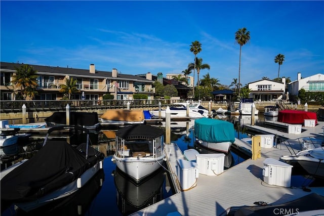 view of dock with a residential view