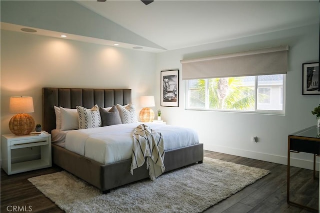 bedroom featuring recessed lighting, vaulted ceiling, baseboards, and wood finished floors