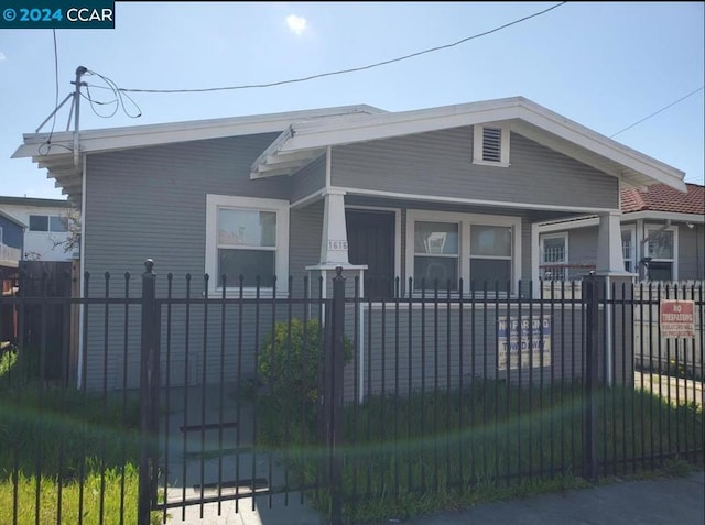 bungalow-style house featuring covered porch