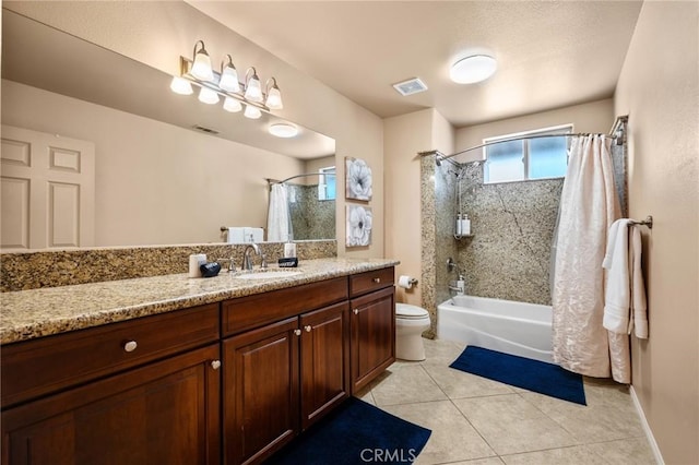 full bathroom featuring shower / tub combo, vanity, toilet, and tile patterned floors