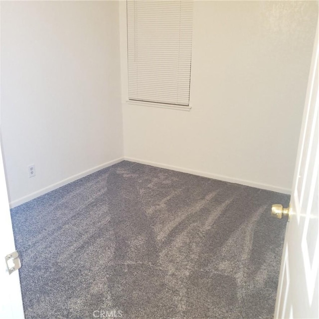 unfurnished room with carpet