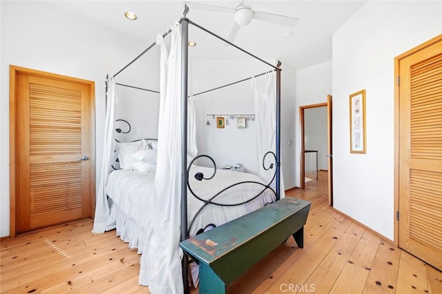 bedroom featuring ceiling fan and light hardwood / wood-style flooring