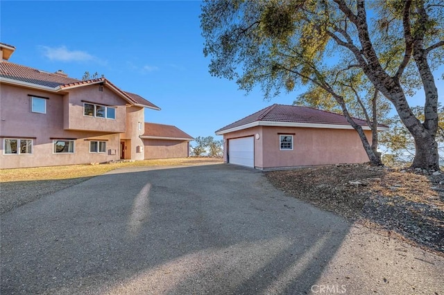 view of home's exterior featuring a garage