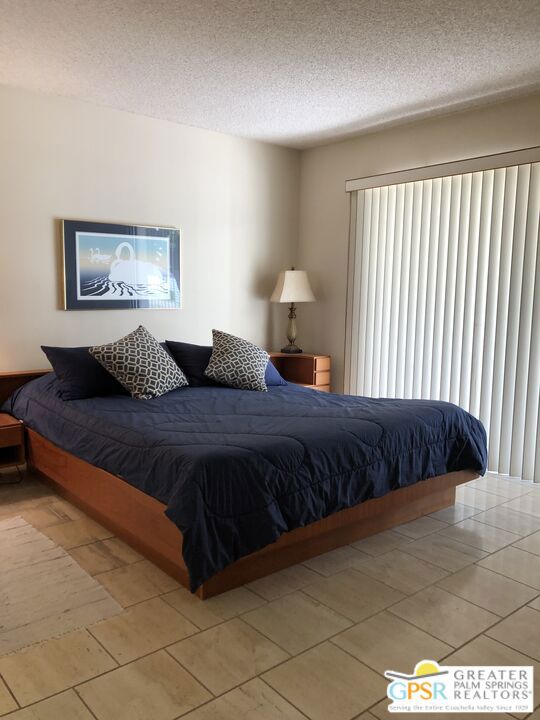 bedroom with a textured ceiling