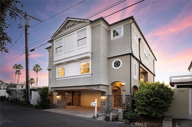 view of front of property with a garage