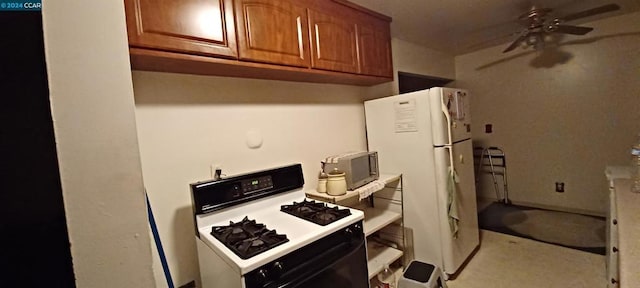 kitchen with ceiling fan and white appliances