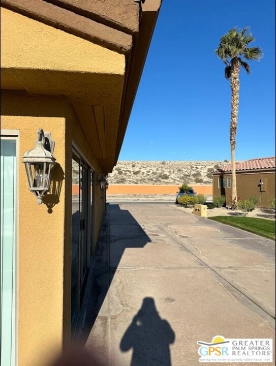 exterior space featuring a mountain view