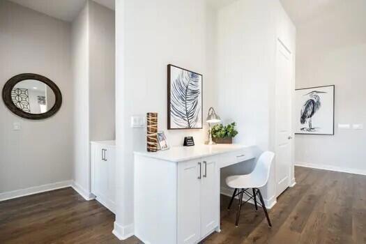 home office featuring dark hardwood / wood-style floors