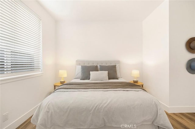 bedroom featuring light wood-type flooring