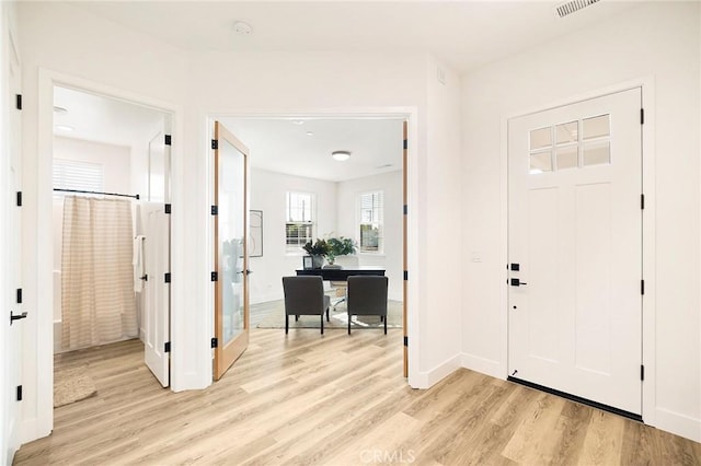 foyer featuring light hardwood / wood-style floors