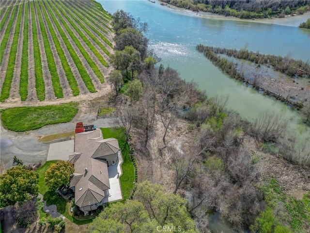 aerial view featuring a rural view and a water view