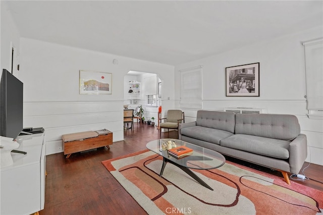 living room featuring dark hardwood / wood-style flooring