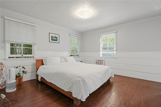 bedroom featuring dark hardwood / wood-style floors