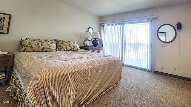 bedroom featuring carpet floors and access to outside