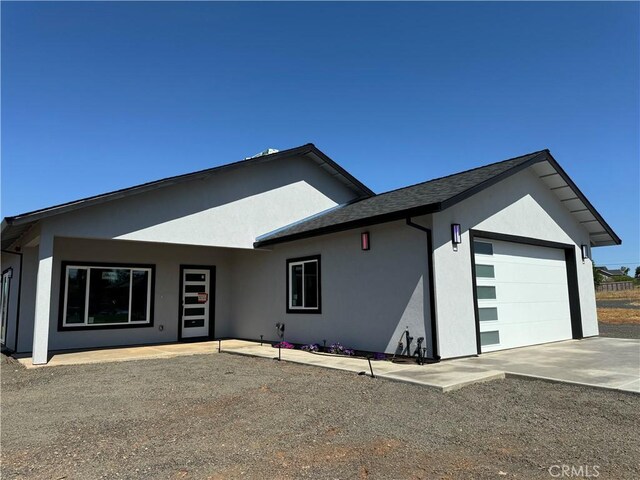 exterior space with a garage