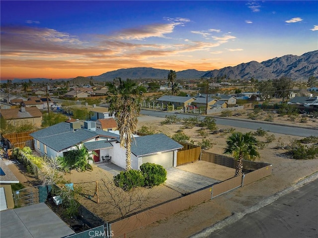 aerial view at dusk with a mountain view