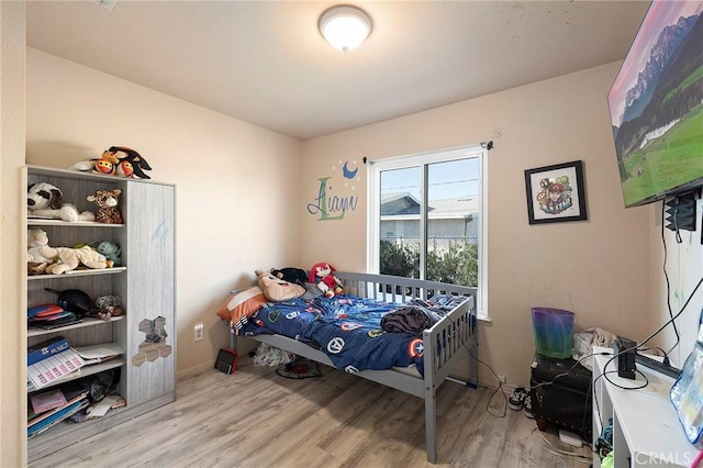 bedroom featuring light hardwood / wood-style flooring