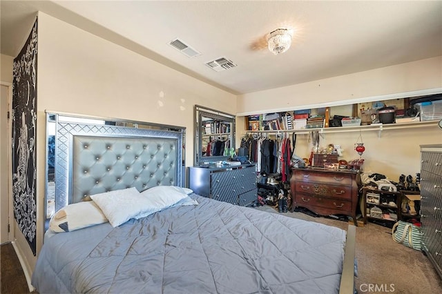 bedroom featuring carpet flooring and a closet