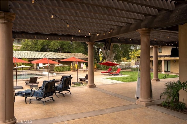 view of patio with a pergola and a community pool