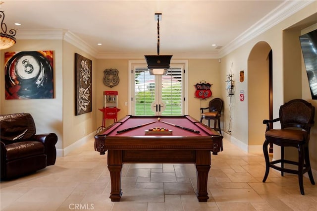 game room with ornamental molding and pool table